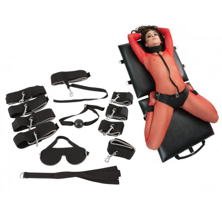 Lettino con accessori costrittivi manette cavigliere morso bondage sadomaso bdsm